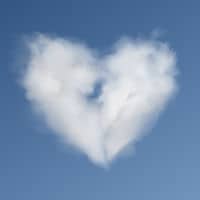 A heart shaped cloud in the sky